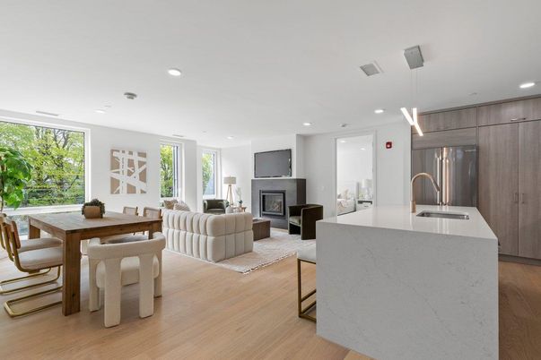 Dining room, Fireplace, Interior, Kitchen, Living room, Pendant Lights, Recessed Lighting, Stainless Steel Appliances, Wood Texture Flooring