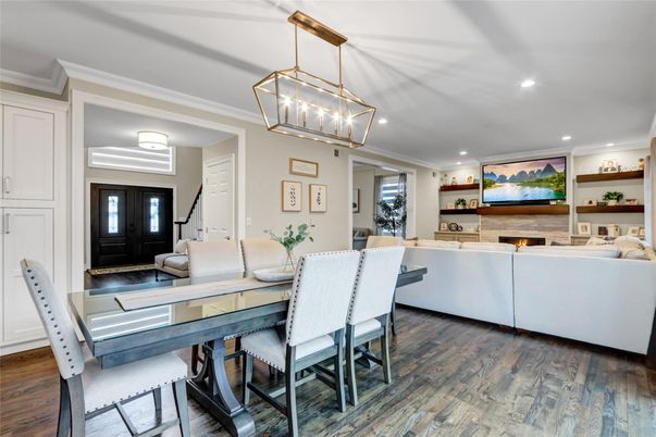 Dining room, Fireplace, Interior, Living room, Pendant Lights, Recessed Lighting, Wood Texture Flooring