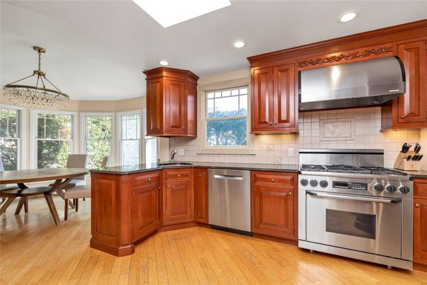 Dining room, Interior, Kitchen, Recessed Lighting, Stainless Steel Appliances, Wood Texture Flooring
