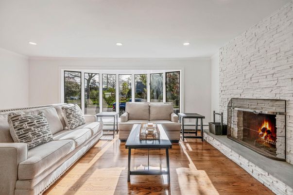 Fireplace, Interior, Living room, Recessed Lighting, Stone Walls, Wood Texture Flooring
