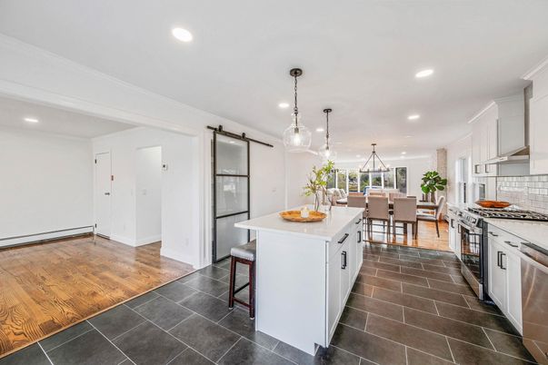 Dining room, Interior, Kitchen, Pendant Lights, Recessed Lighting, Stainless Steel Appliances, Wood Texture Flooring