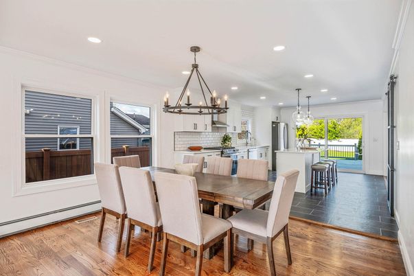Chandelier, Dining room, Interior, Kitchen, Pendant Lights, Recessed Lighting, Stainless Steel Appliances, Wood Texture Flooring