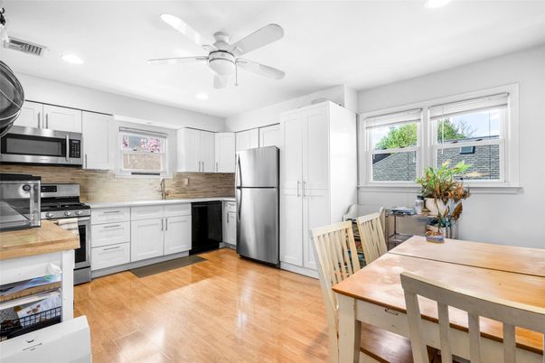 Dining room, Interior, Kitchen, Recessed Lighting, Stainless Steel Appliances, Wood Texture Flooring
