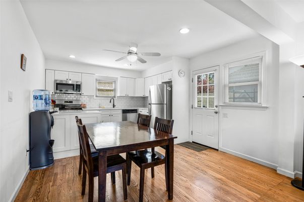 Dining room, Interior, Kitchen, Recessed Lighting, Stainless Steel Appliances, Wood Texture Flooring
