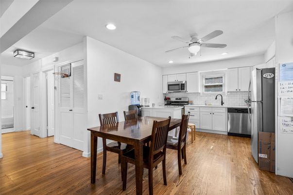 Dining room, Interior, Kitchen, Recessed Lighting, Stainless Steel Appliances, Wood Texture Flooring