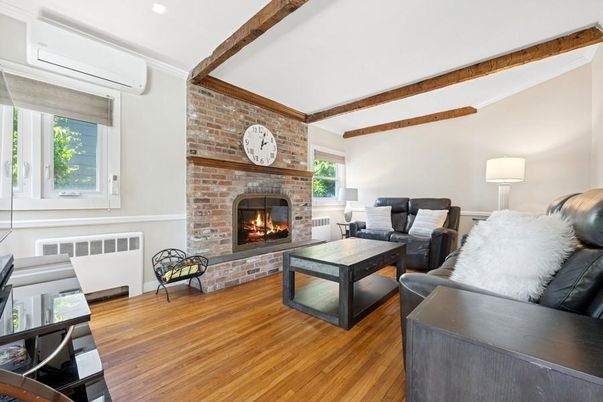 Fireplace, Interior, Living room, Recessed Lighting, Stone Walls, Wooden Beams, Wood Texture Flooring