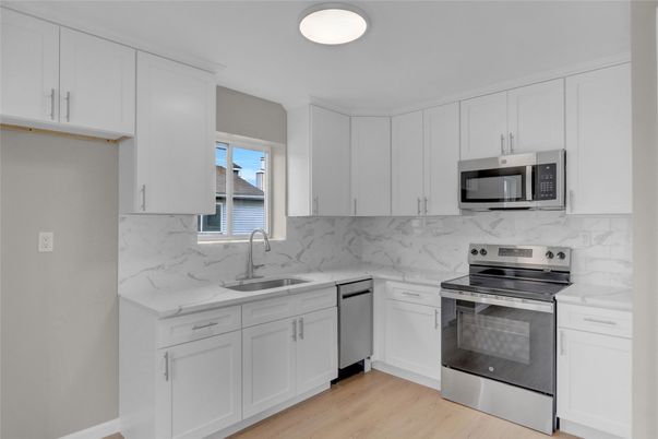 Interior, Kitchen, Marble Walls, Stainless Steel Appliances, Wood Texture Flooring
