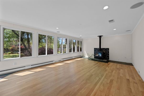 Empty room, Fireplace, Interior, Recessed Lighting, Wood Texture Flooring