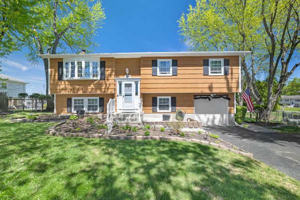 Attached, Exterior, Facade, Raised Ranch