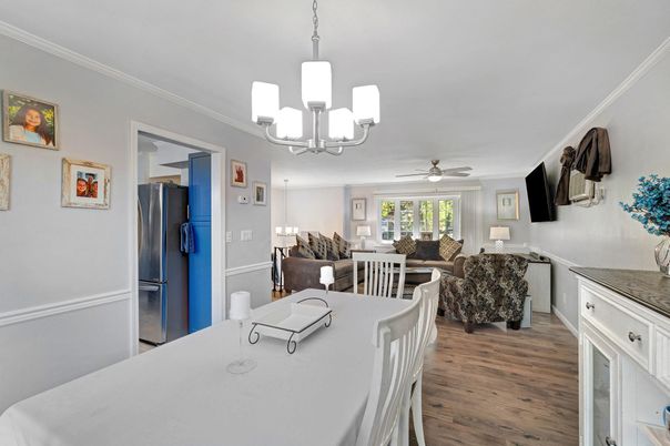 Chandelier, Dining room, Interior, Kitchen, Living room, Stainless Steel Appliances, Wood Texture Flooring