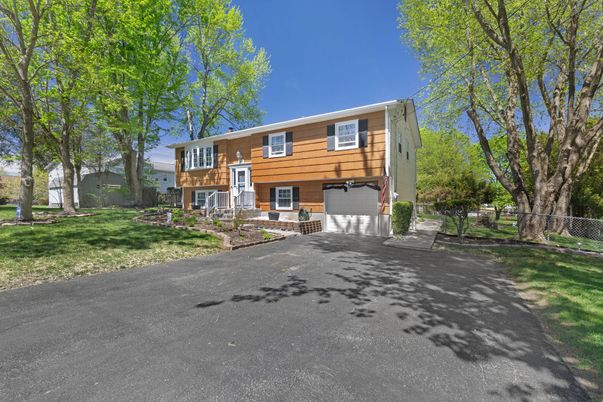 Attached, Backyard, Exterior, Facade, Raised Ranch
