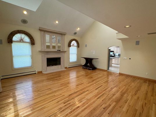 Empty room, Fireplace, Interior, Recessed Lighting, Wood Texture Flooring