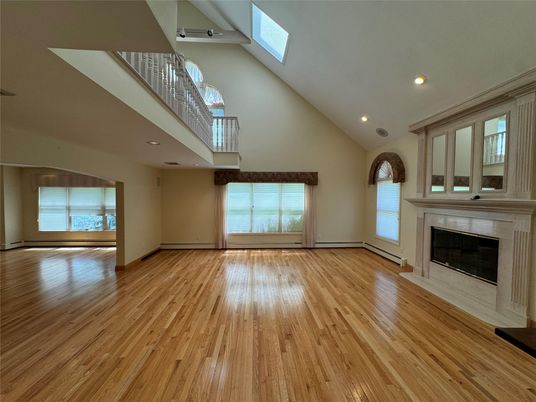 Empty room, Fireplace, Interior, Recessed Lighting, Wood Texture Flooring