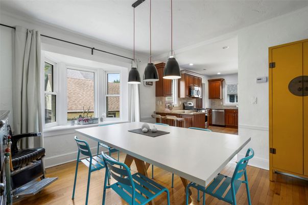 Dining room, Interior, Kitchen, Pendant Lights, Recessed Lighting, Stainless Steel Appliances, Wood Texture Flooring