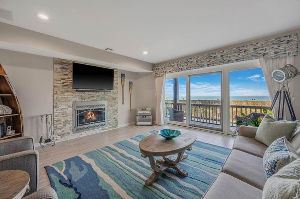 Fireplace, Interior, Living room, Recessed Lighting, Stone Walls, Wood Texture Flooring