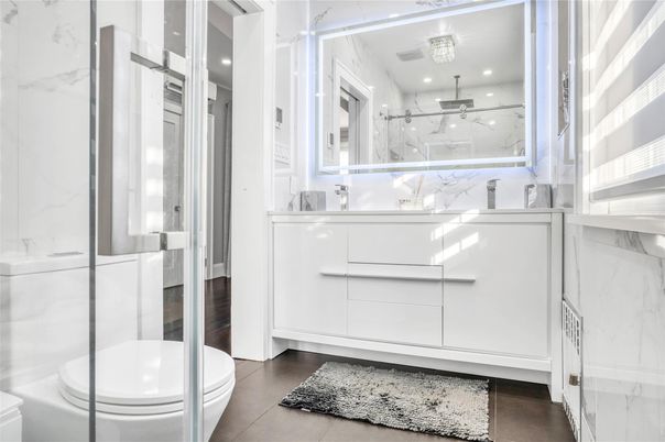 Bathroom, Glass Shower, Interior, Marble Walls, Recessed Lighting, Wood Texture Flooring