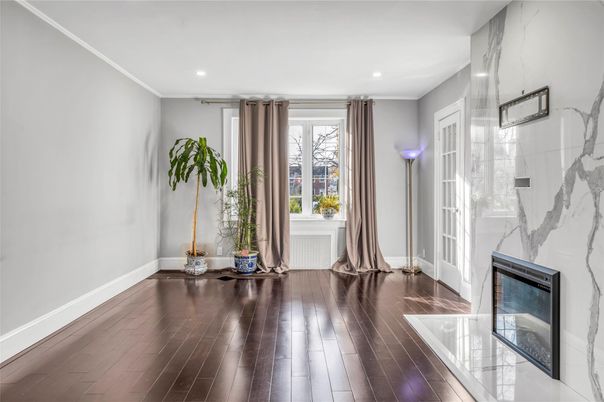 Fireplace, Interior, Marble Walls, Recessed Lighting, Wood Texture Flooring