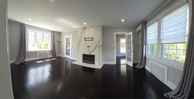 Fireplace, Interior, Marble Walls, Recessed Lighting, Wood Texture Flooring