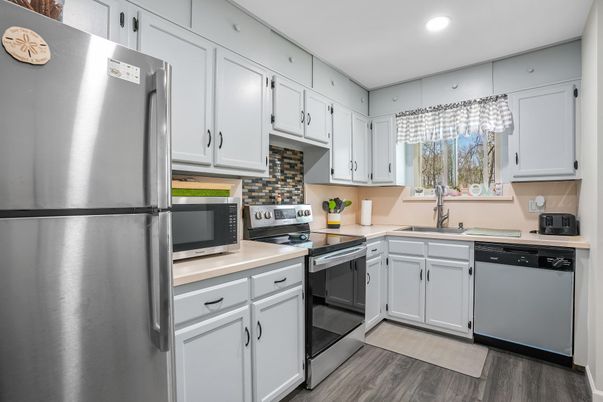 Interior, Kitchen, Recessed Lighting, Stainless Steel Appliances, Wood Texture Flooring