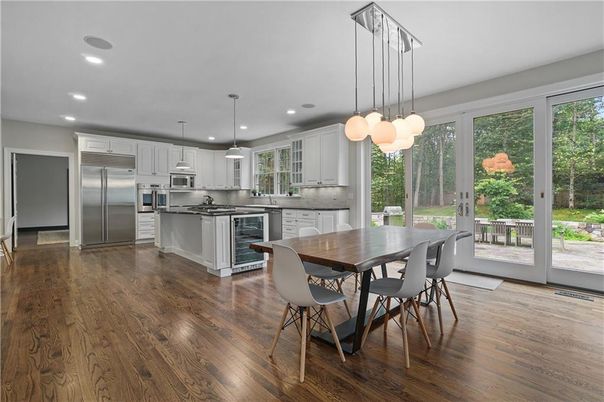 Dining room, Interior, Kitchen, Pendant Lights, Recessed Lighting, Stainless Steel Appliances, Wood Texture Flooring