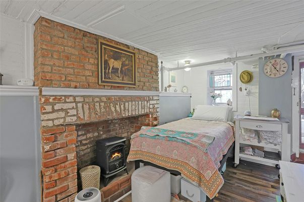 Bedroom, Fireplace, Interior, Stone Walls, Wood Texture Flooring