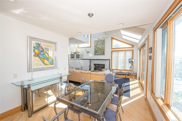 Dining room, Fireplace, Interior, Living room, Pendant Lights, Recessed Lighting, Wood Texture Flooring