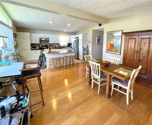 Dining room, Interior, Kitchen, Recessed Lighting, Stainless Steel Appliances, Wood Texture Flooring
