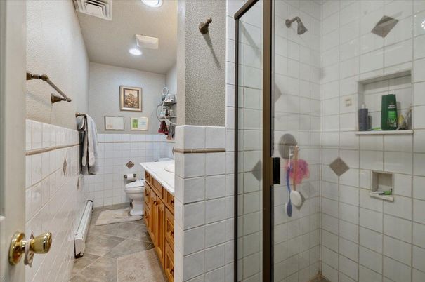 Bathroom, Glass Shower, Interior, Recessed Lighting, Tile Countertops