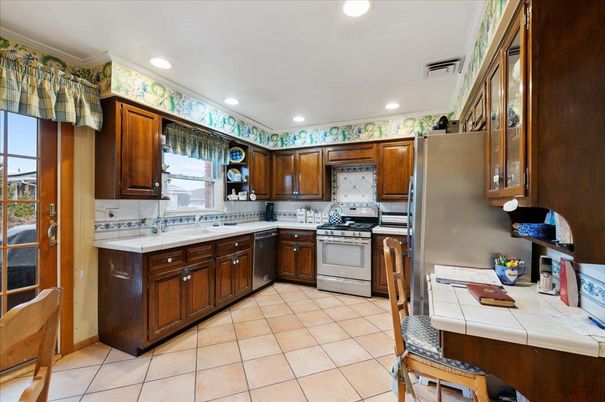 Interior, Kitchen, Recessed Lighting, Stainless Steel Appliances, Tile Countertops