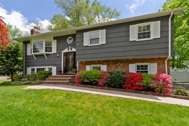 Exterior, Facade, Brick Facade, Raised Ranch