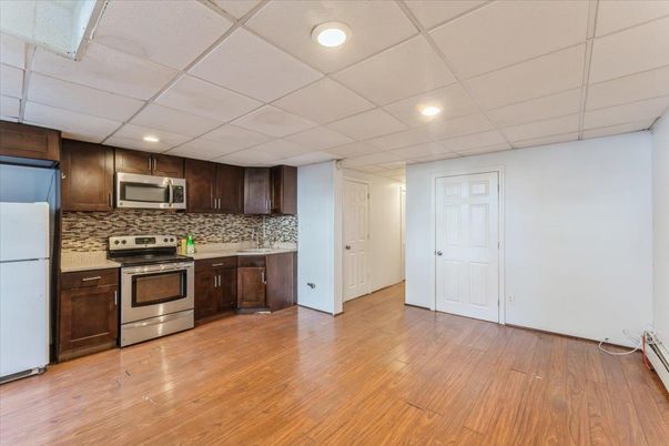 Interior, Kitchen, Recessed Lighting, Stainless Steel Appliances, Wood Texture Flooring