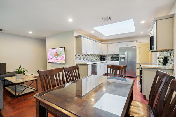 Dining room, Interior, Kitchen, Recessed Lighting, Stainless Steel Appliances, Wood Texture Flooring