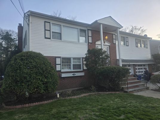 Exterior, Facade, Brick Facade, Raised Ranch