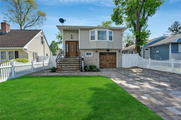 Attached, Exterior, Facade, Raised Ranch