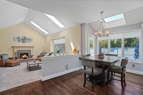 Chandelier, Dining room, Fireplace, Interior, Living room, Recessed Lighting, Wood Texture Flooring