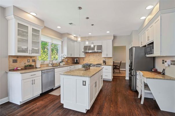 Dining room, Interior, Kitchen, Pendant Lights, Recessed Lighting, Stainless Steel Appliances, Wood Texture Flooring