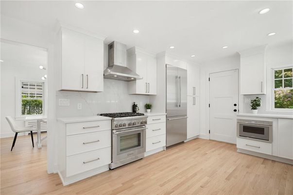 Dining room, Interior, Kitchen, Recessed Lighting, Stainless Steel Appliances, Wood Texture Flooring