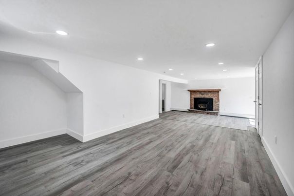 Empty room, Fireplace, Interior, Recessed Lighting, Wood Texture Flooring
