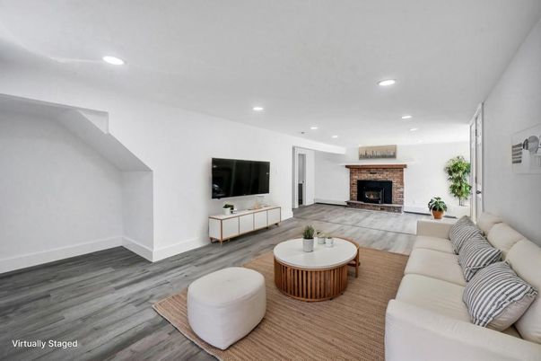 Fireplace, Interior, Living room, Recessed Lighting, Wood Texture Flooring