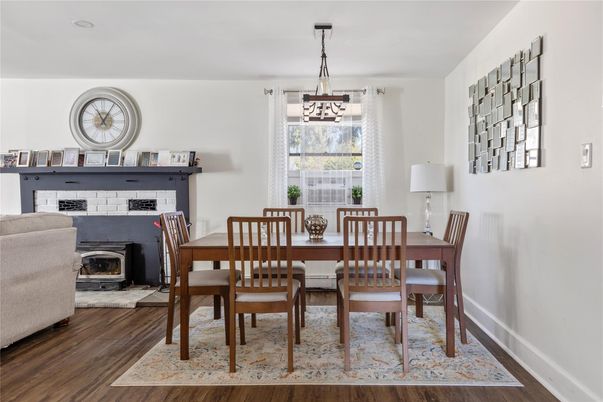 Dining room, Fireplace, Interior, Pendant Lights, Wood Texture Flooring