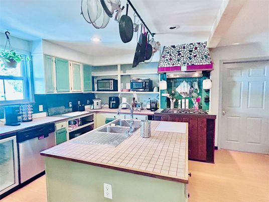 Interior, Kitchen, Recessed Lighting, Stainless Steel Appliances, Tile Countertops
