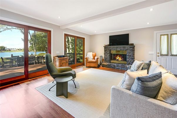 Fireplace, Interior, Living room, Recessed Lighting, Water, Wood Texture Flooring
