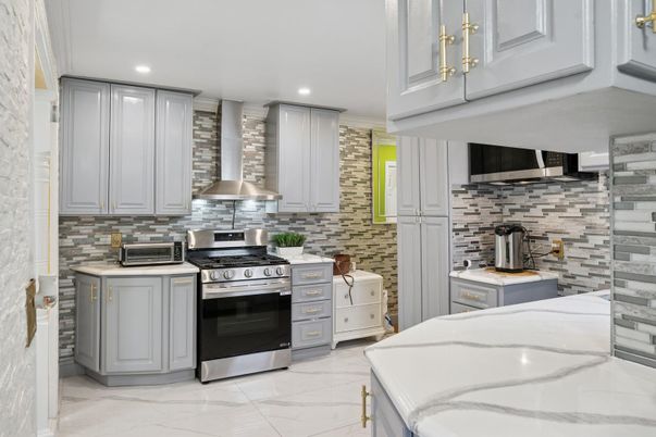 Interior, Kitchen, Marble, Recessed Lighting, Stainless Steel Appliances, Stone Walls