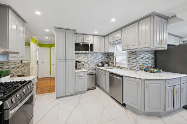 Interior, Kitchen, Marble, Recessed Lighting, Stainless Steel Appliances, Wood Texture Flooring