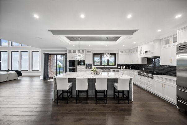 Chandelier, Interior, Kitchen, Pendant Lights, Recessed Lighting, Stainless Steel Appliances, Wood Texture Flooring