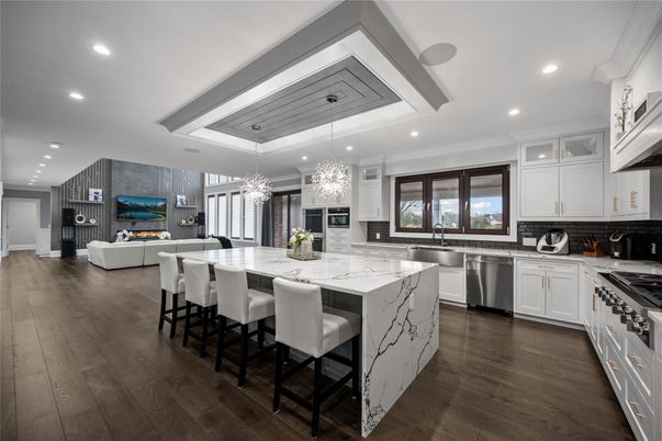 Chandelier, Interior, Kitchen, Living room, Pendant Lights, Recessed Lighting, Stainless Steel Appliances, Wood Texture Flooring