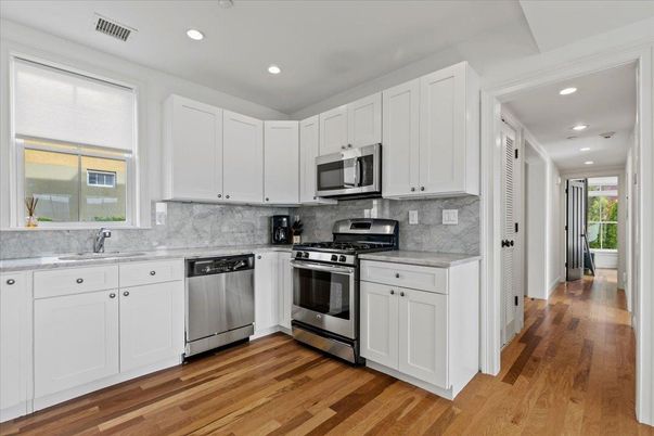 Interior, Kitchen, Recessed Lighting, Stainless Steel Appliances, Wood Texture Flooring