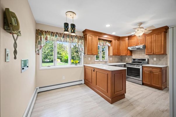 Interior, Kitchen, Pendant Lights, Recessed Lighting, Stainless Steel Appliances, Wood Texture Flooring