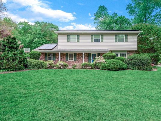 Exterior, Facade, Brick Facade, Solar Panels, Split Level