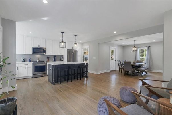 Dining room, Interior, Kitchen, Pendant Lights, Recessed Lighting, Stainless Steel Appliances, Wood Texture Flooring